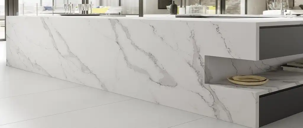 Compac - kitchen-island-with-built-up-edges-in-Compac-Unique-Calacatta-quartz-1024x434