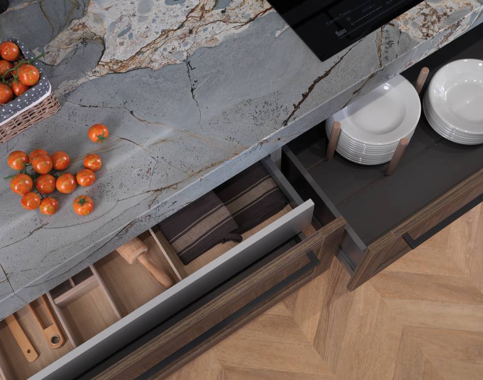 Luxury spa lounge with large-format gray porcelain tile, slate accent wall and panoramic lake view