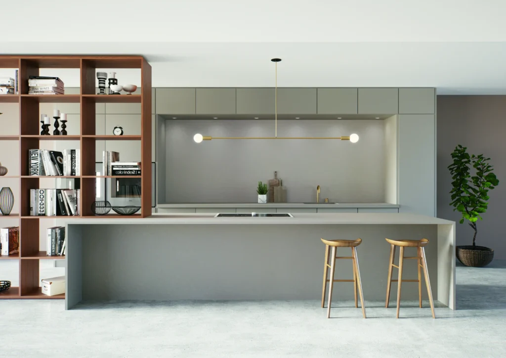 Modern minimalist kitchen with gray cabinets, a large island, two wood bar stools, and a tall wooden bookshelf.